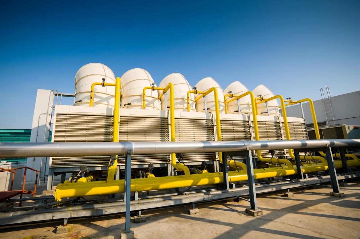 Commercial cooling tower with water softening system