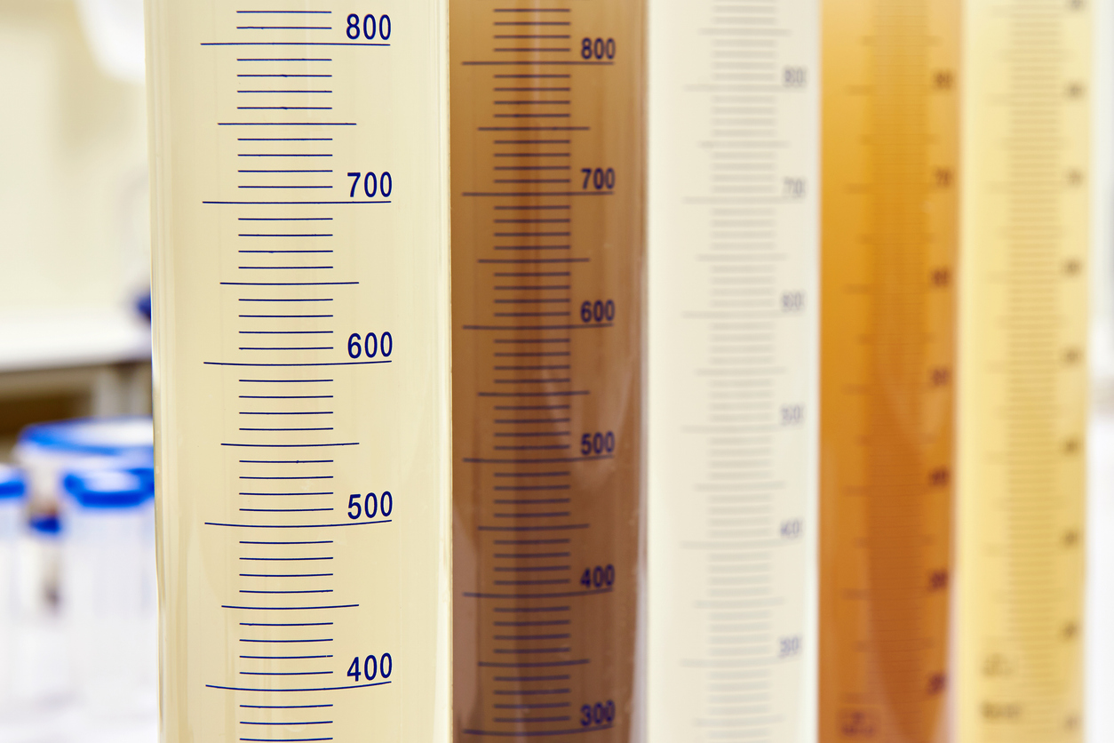 Cloudy turbid water sample before clarification treatment